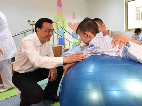 這三年，總理牽掛的殘疾人群體，迎來哪些暖政？