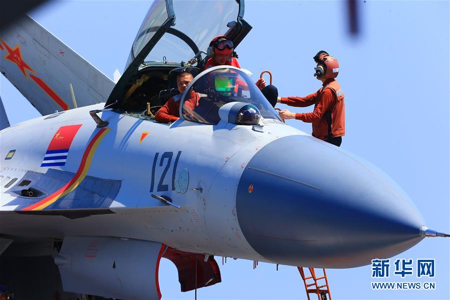（在習近平強軍思想指引下&middot;我們在戰(zhàn)位報告&middot;圖文互動）（2）奮飛在新時代的海天&mdash;&mdash;海軍某艦載航空兵部隊備戰(zhàn)打仗記事