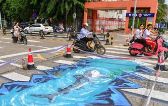 &ldquo;海洋世界&rdquo;3D立體斑馬線亮相?？? />  
<div>“海洋世界”3D立體斑馬線亮相海口</div>
</a> 
</div>
<div   id=