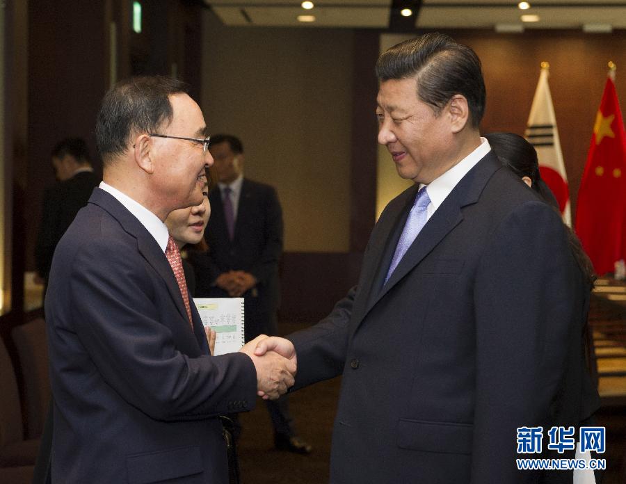 7月4日，國家主席習近平在首爾會見韓國總理鄭烘原。 新華社記者謝環馳攝  