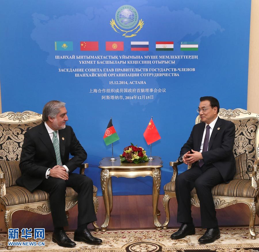 12月15日，中國國務院總理李克強在阿斯塔納會見阿富汗首席執(zhí)行官阿卜杜拉。 新華社記者 龐興雷 攝