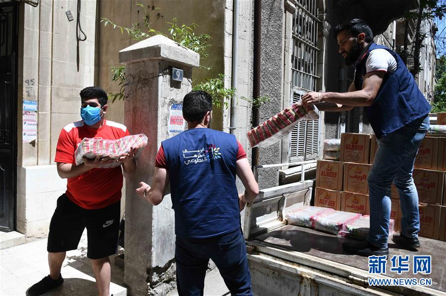 （國際疫情&middot;圖文互動）（2）通訊：疫情中，那抹笑容最難忘&mdash;&mdash;記向困難家庭發放愛心包裹的敘利亞青年志愿者