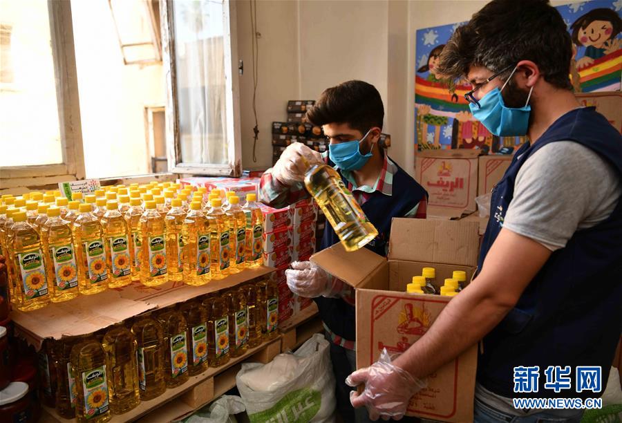 （國際疫情&middot;圖文互動）（6）通訊：疫情中，那抹笑容最難忘&mdash;&mdash;記向困難家庭發放愛心包裹的敘利亞青年志愿者